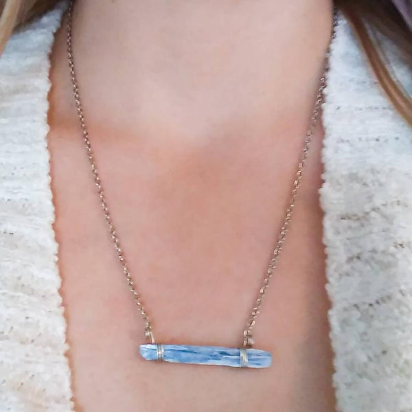 Blue Kyanite hand wrapped crystal necklace on a woman's neck | Handmade Women's Intention Jewelry