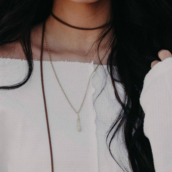 Clear Quartz Hand Wrapped Crystal Necklace, on a brunette models neck | Handmade Intention Jewelry